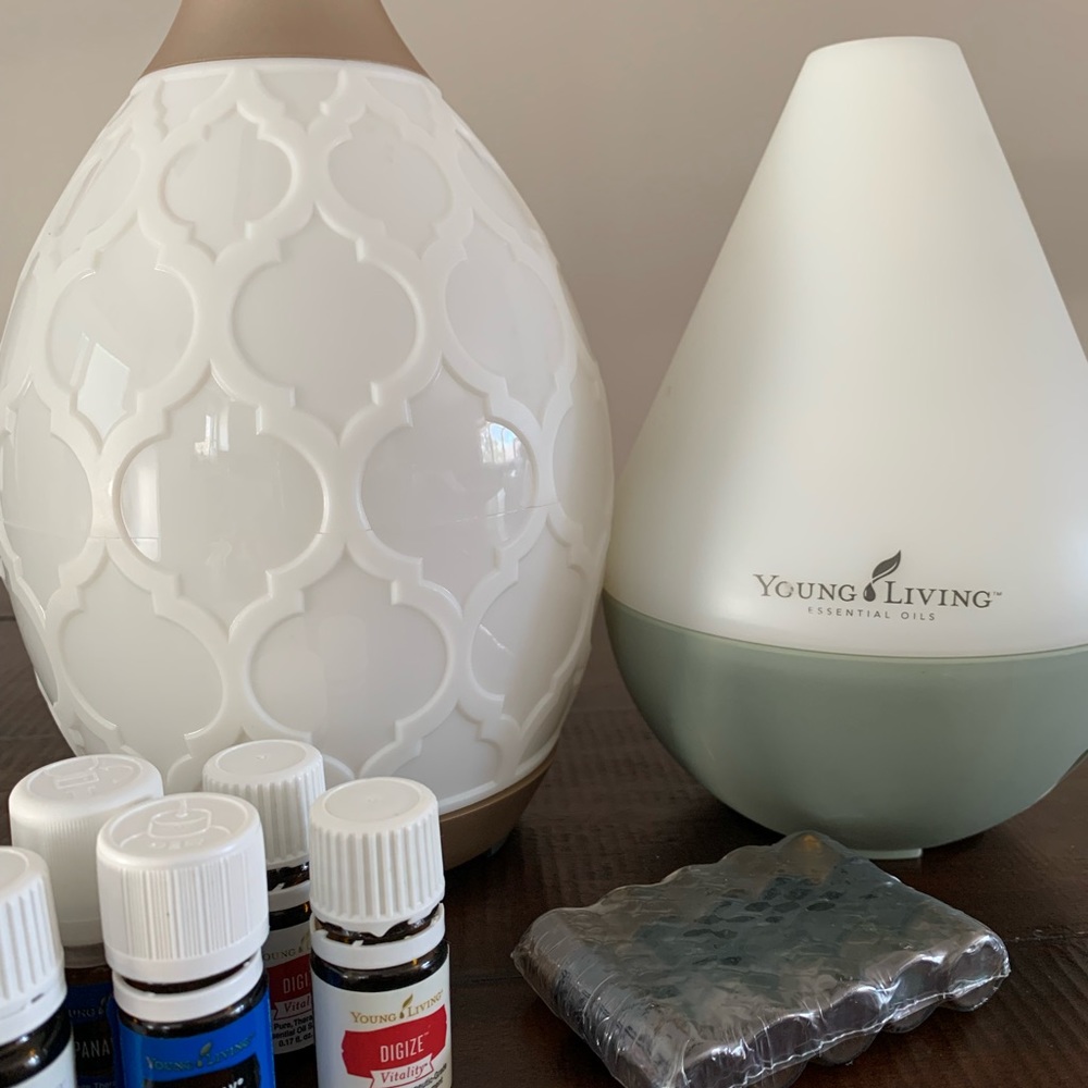 2 Young Living Diffusers with oils copaiba, pan away, digize